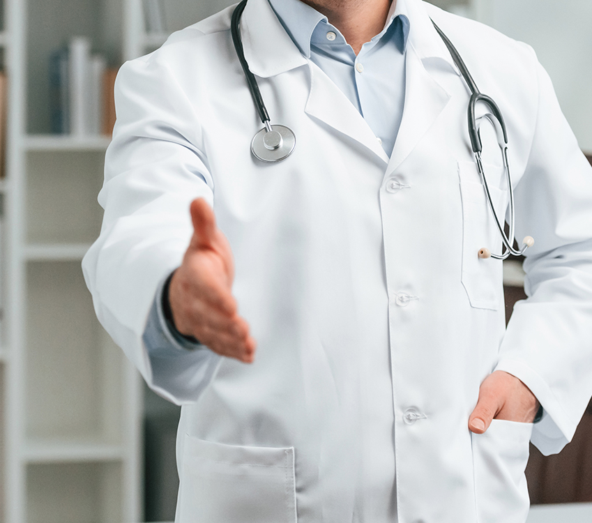 With stethoscope. Doctor in formal clothes is working in the cabinet Medicina del lavoro